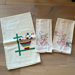 Vintage kitchen linens, two dish towels and one card table sized cloth